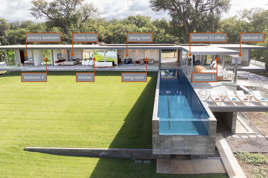 Luxurious property, showcasing the main areas including the primary bedroom, bedrooms 2 through 4, media room, dining room, living room, and kitchen.