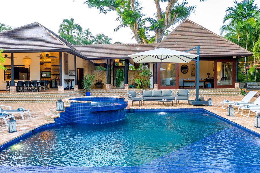 Spacious outdoor area of Casa Tamarindos, featuring a beautifully designed pool with a spa.