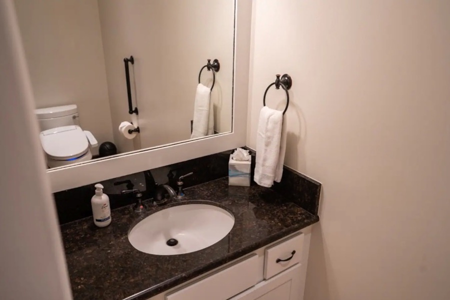 Bathroom off of the home theater so you don't miss too much of the movie!