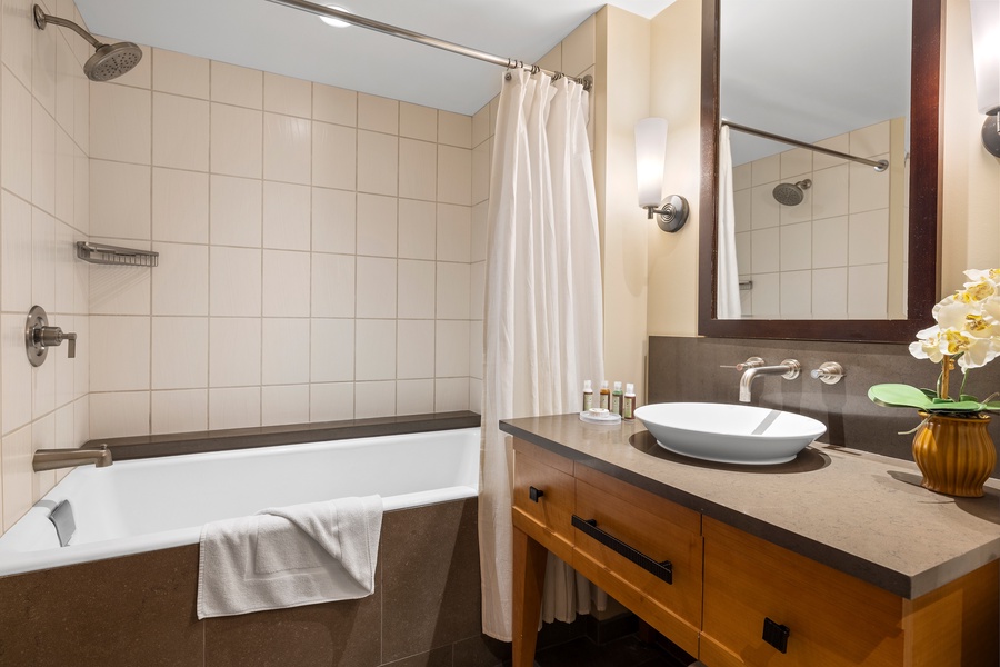 The second guest bathroom with a shower and tub.