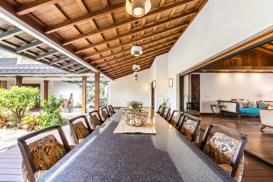 Alfresco dining for ten on the expansive lanai, just steps from the indoor great room.