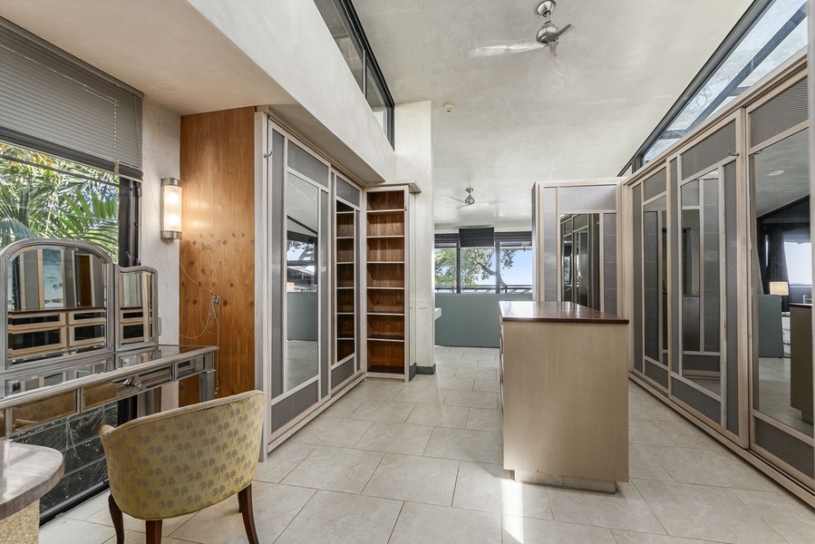 Another view of the sleek walk-in closet, designed for convenience and style.