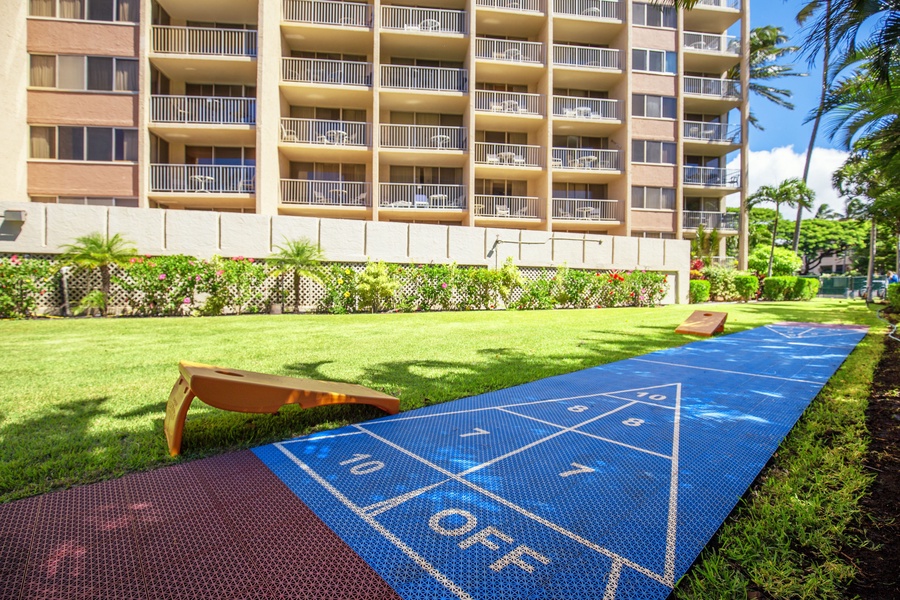 Enjoy a game of shuffleboard on the outdoor court, perfect for some friendly competition.