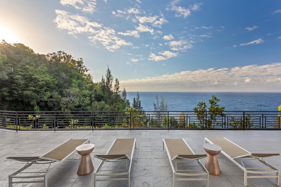 Enjoy breathtaking ocean views from the sun loungers on the lanai.