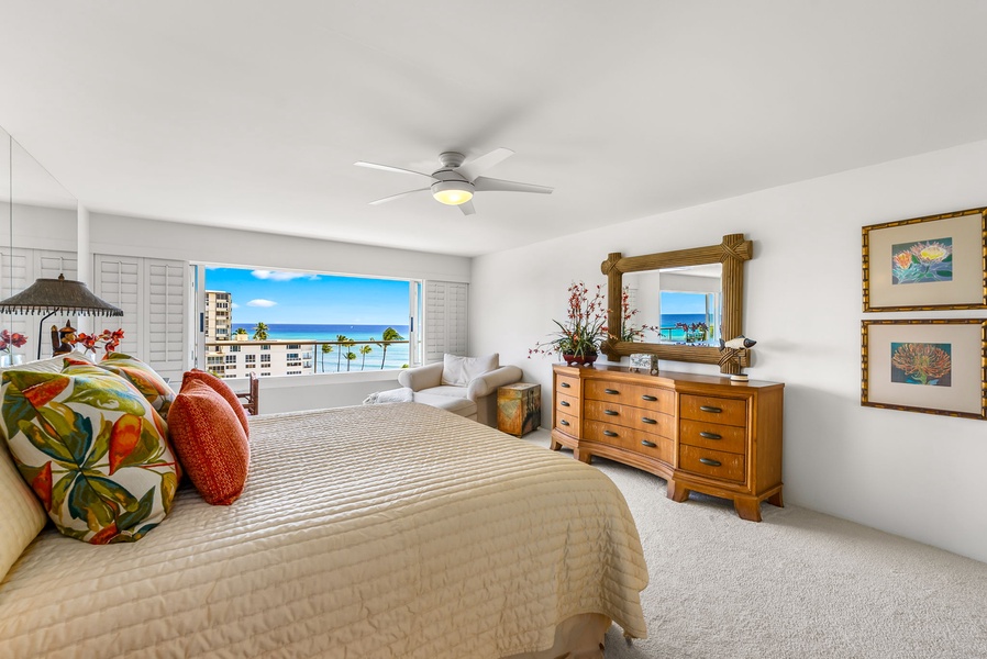 Spacious primary suite with panoramic views of Diamond Head and the coastline, offering a peaceful retreat to begin and end each day.