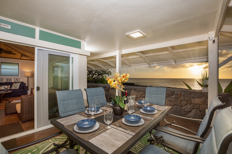 Outside covered lanai with dining table for six