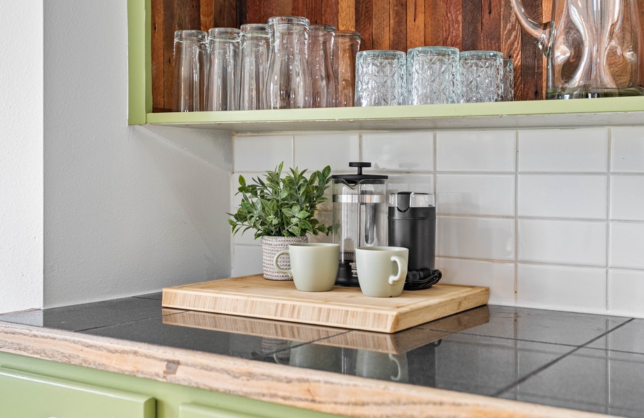 Stylish and efficient, this kitchen coffee station makes it easy to start your day with a fresh brew and a mountain view.