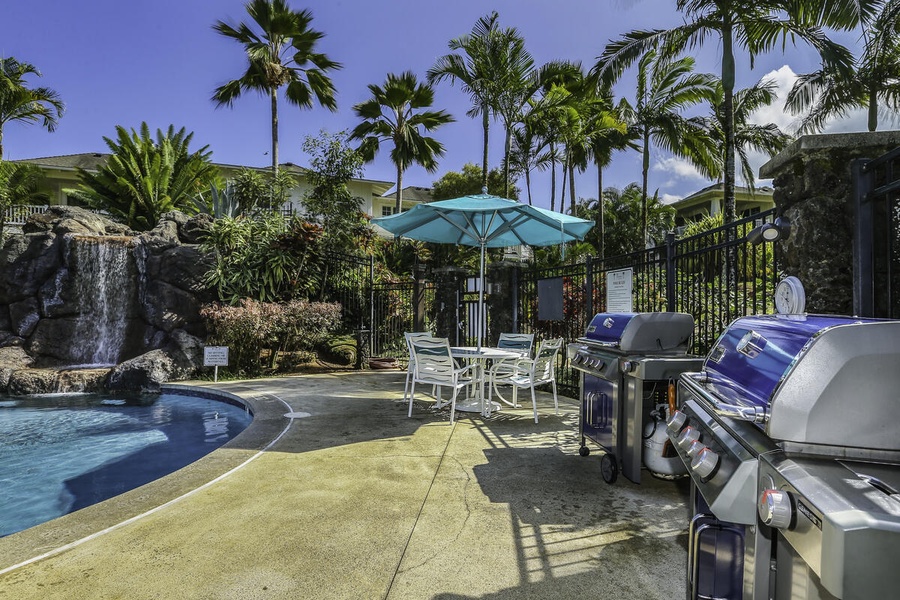 Resort-style pool with shaded loungers and tropical vibes all around.