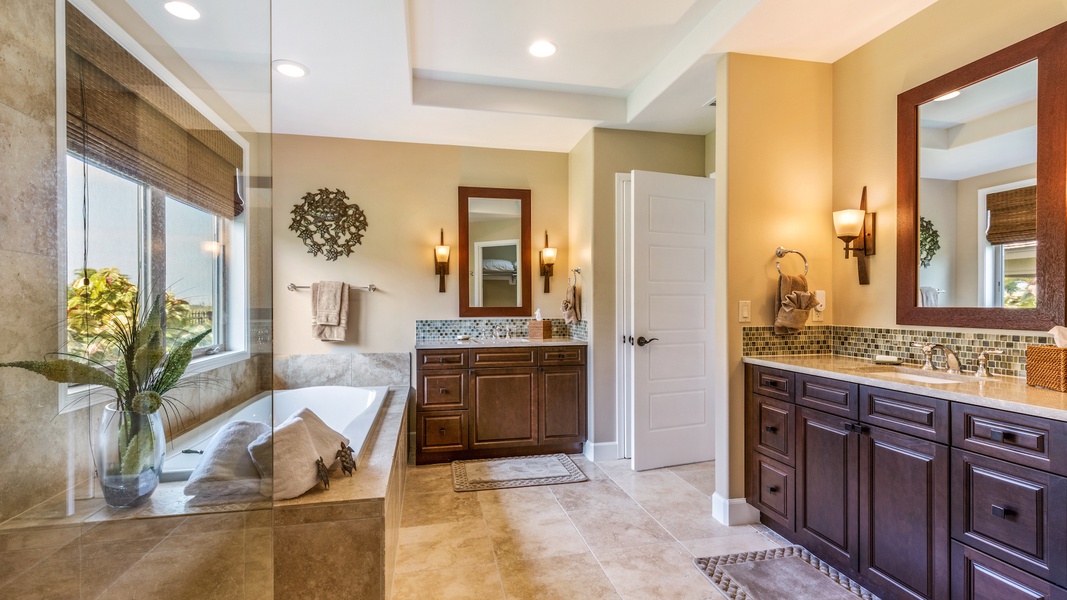 Primary bath, with dual sinks, large soaking tub, and separate walk-in shower.