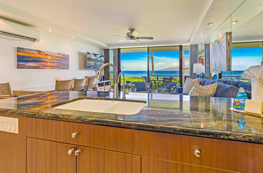 Enjoy uninterrupted ocean views from the kitchen at Papakea L-106