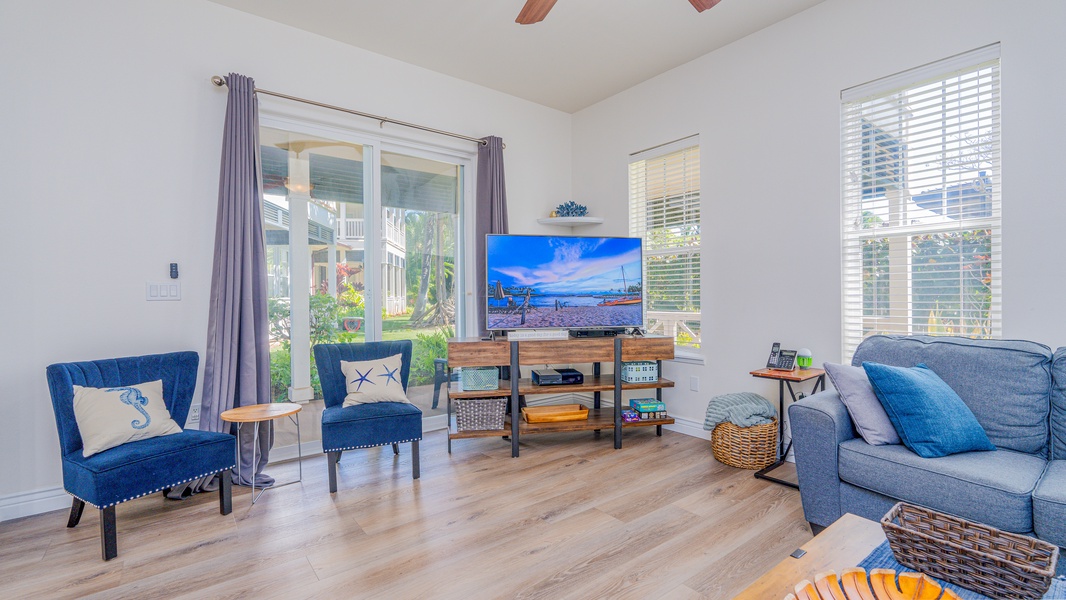 Other side of the living room with the beautiful view of the lanai and garden.