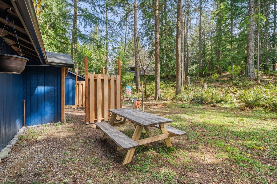 Dine outdoors with the sounds of nature as your soundtrack at the picnic bench just outside the cabin.