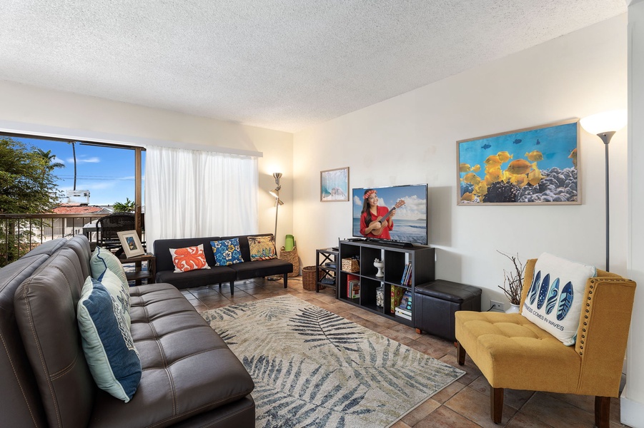 Cozy up in the inviting living room, complete with seating for six and a warm atmosphere.