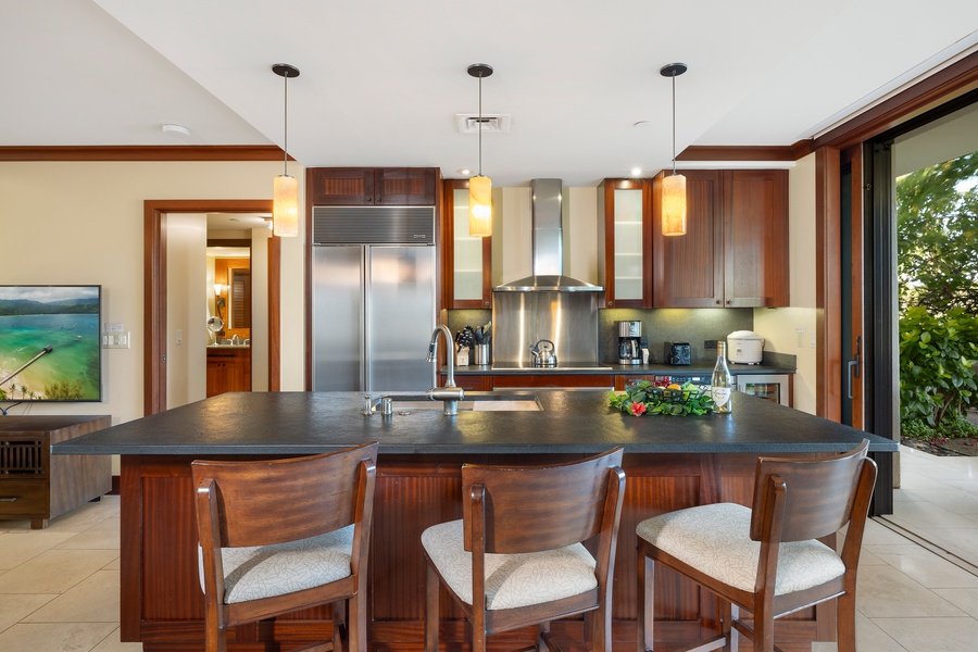 Kitchen island/bar for quick meals or cheers.