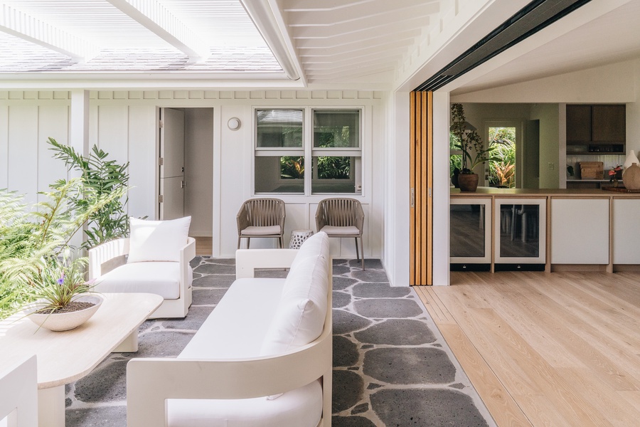 Comfortable outdoor seating creates an inviting space to relax and gather.