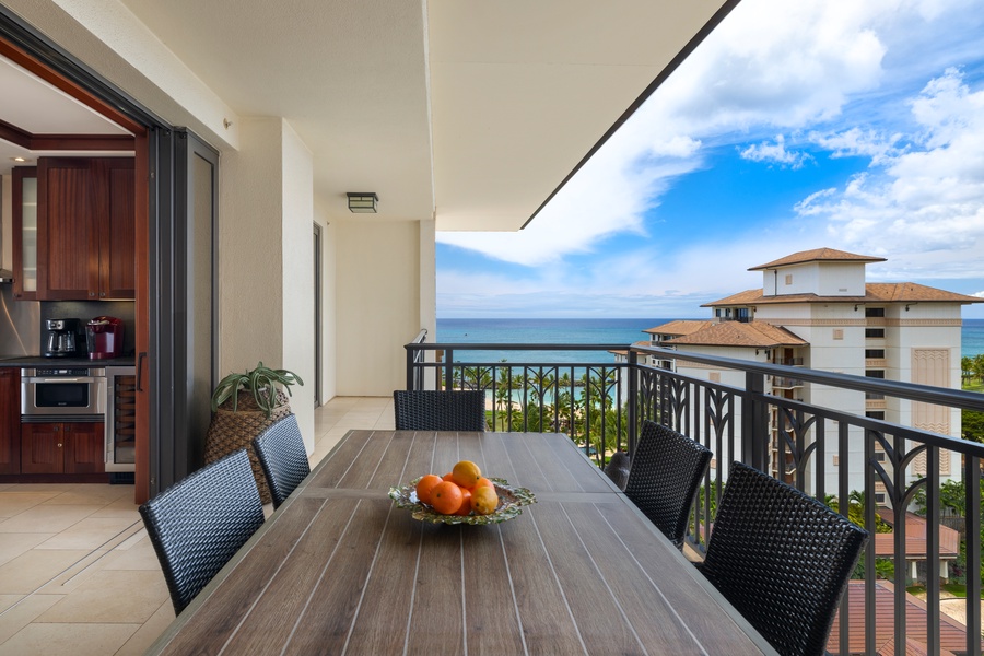 Savor your morning coffee at this ocean-view dining table, where tropical breezes and stunning sea vistas create the perfect backdrop for every meal.