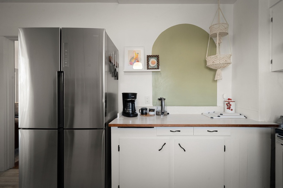 Enjoy a practical kitchen layout with stainless appliances and space for easy meal prep.