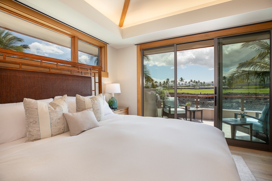 King bed primary suite with access to balcony to savor the morning breeze after a deep nightly slumber