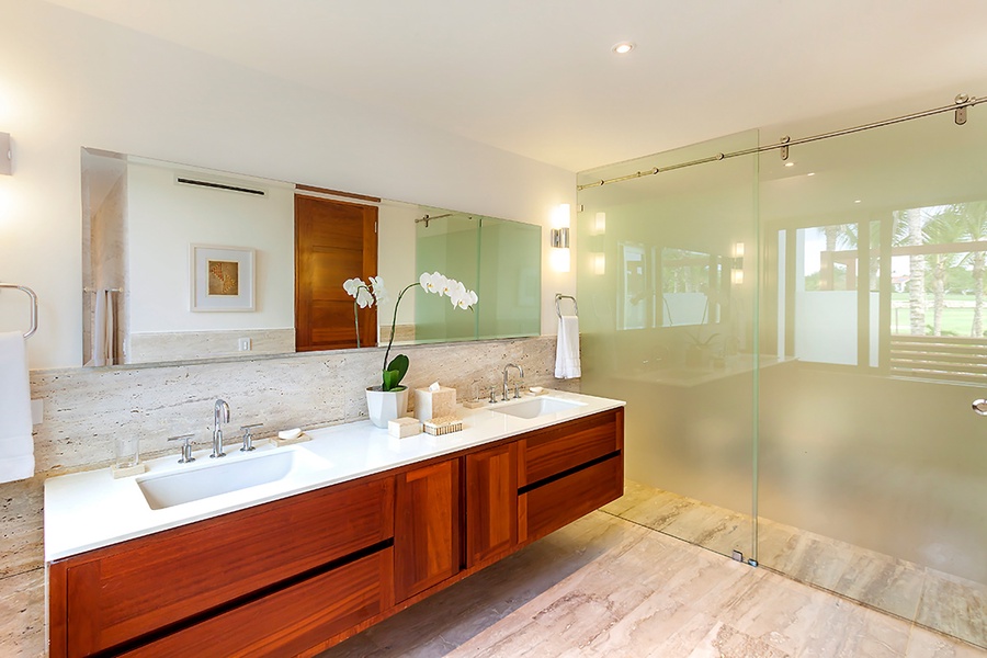 The expansive ensuite bathroom has dual vanities and separate shower.