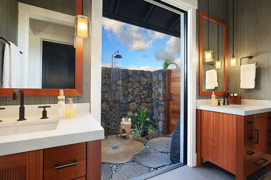 The guest bathroom features an amazing outdoor shower.