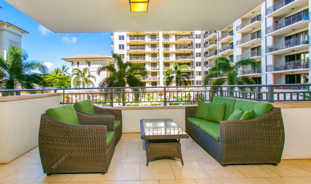Another incredible view of the lanai surrounded by swaying palm trees.