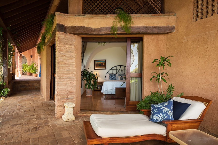 Cozy outdoor lounge by the guest bedroom.