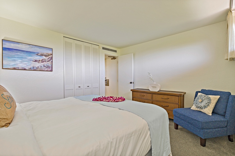 This spacious bedroom at Kaanapali Shores 544 offers ample storage and a peaceful, relaxing atmosphere.