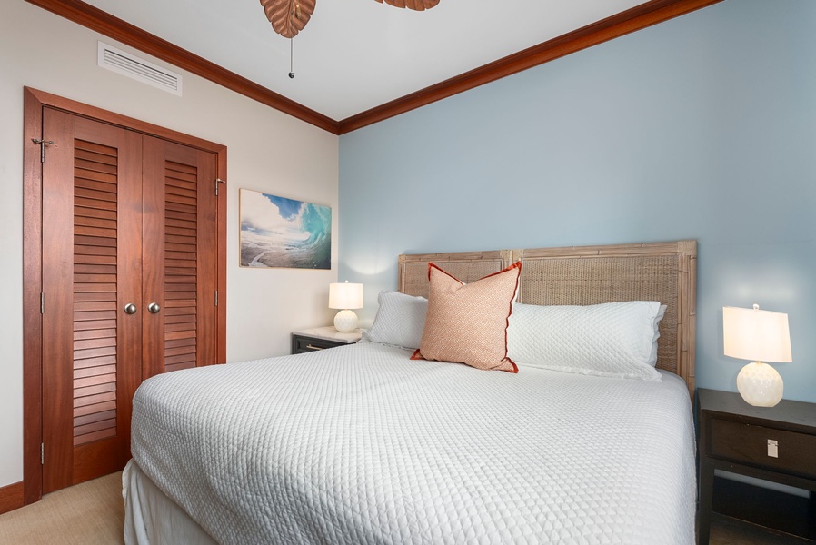 Drift off in your coastal-inspired bedroom with soothing blue walls, warm wood accents, and crisp linens—perfect for peaceful nights.