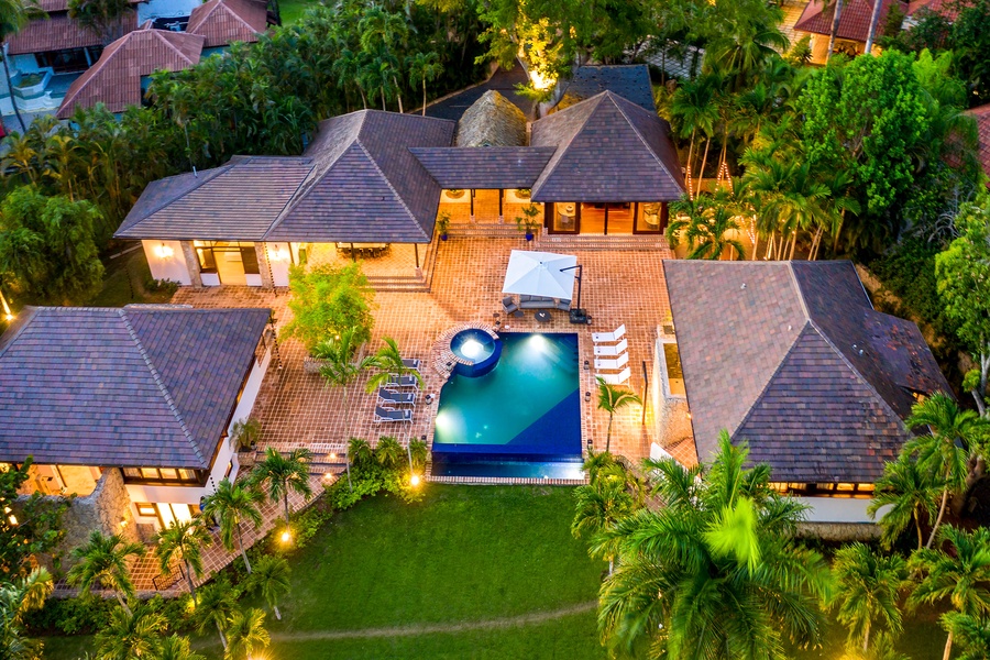 The expansive Casa de Campo estate, featuring lush greenery and a stunning pool area.