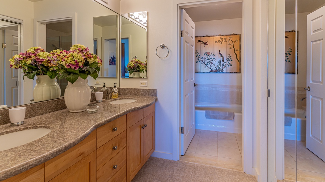 The primary guest bathroom is a tastefully decorated full bathroom.