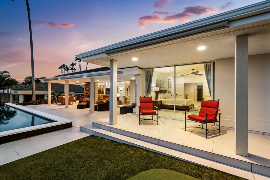 Soft lighting and open sightlines create a warm, welcoming nighttime vibe.