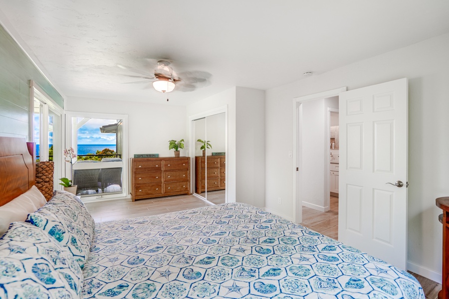 Guest suite 1 with a plush queen bed and private lanai.