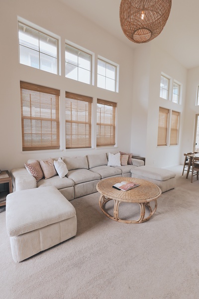 Sink into the plush sectional—perfect for post-beach lounging or evening chats with loved ones.