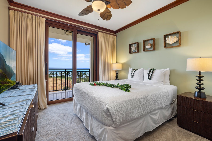 Your ocean-view bedroom features tropical touches and a private balcony where you'll wake to stunning sea vistas.