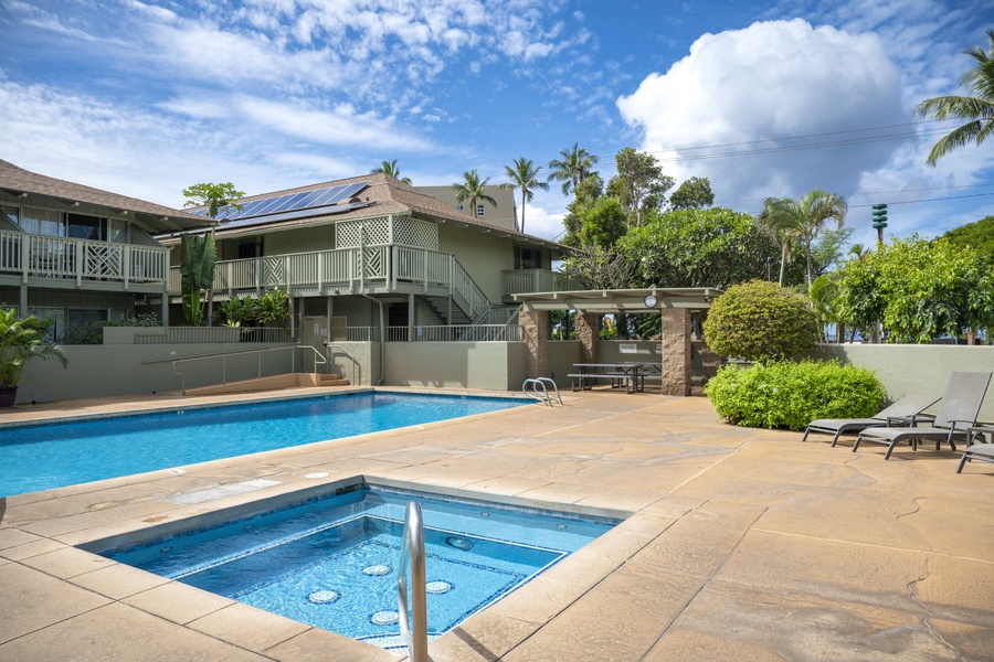 Dive into paradise with resort pool and spa, surrounded by tropical gardens under Hawaiian skies.