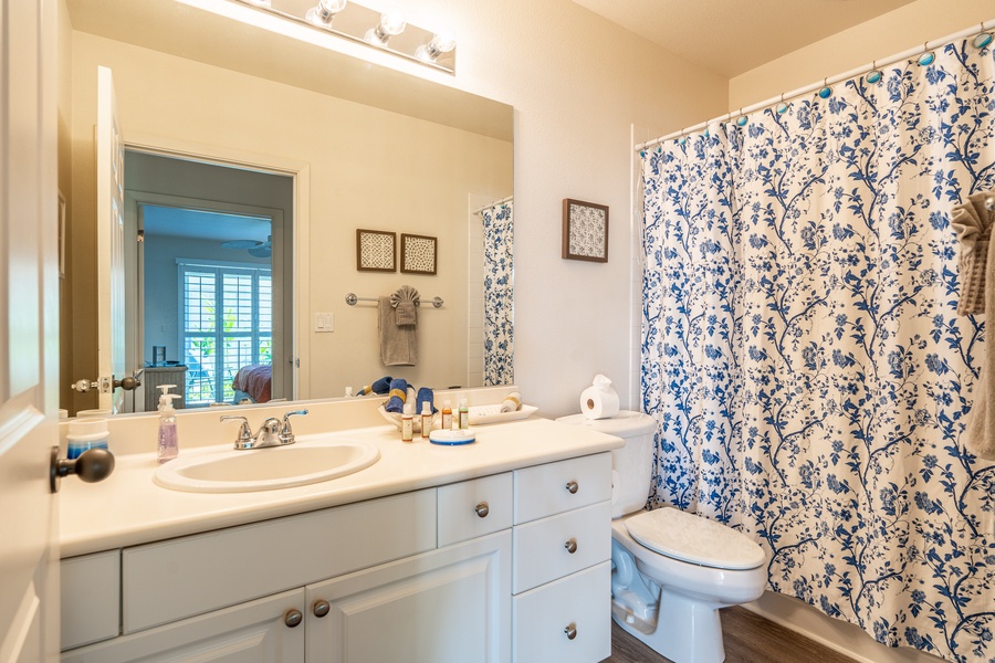 The guest bathroom features a shower and all the amenities you need.