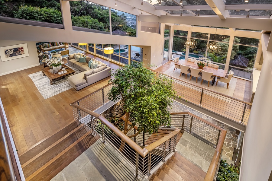 Soaring ceilings and architectural details bring light and harmony to this multi-level layout.