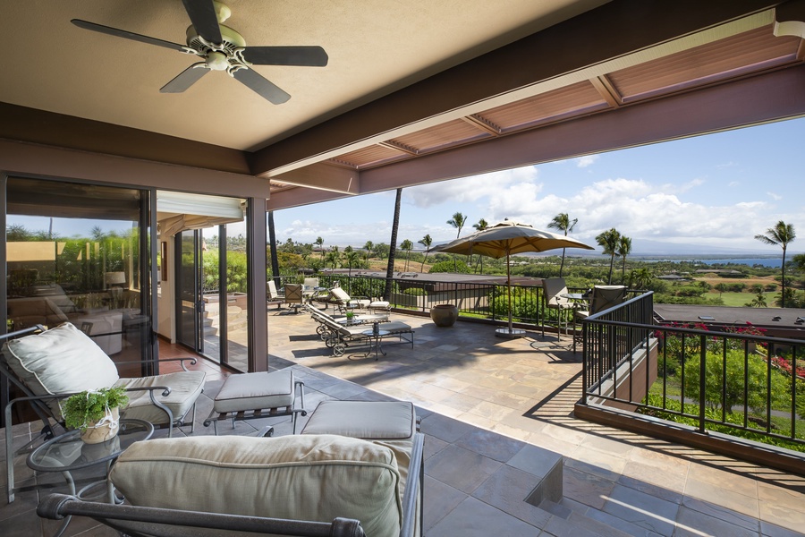 Extended lanai with multiple seating areas, inviting you to enjoy island breezes and dramatic sunsets.