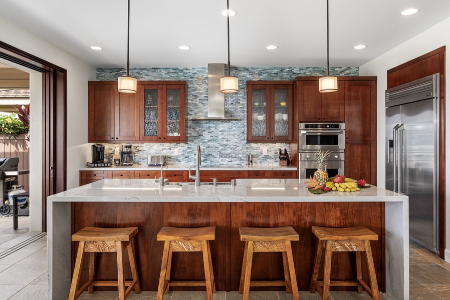 Prepare delicious island meals in the stylish kitchen with a breakfast bar.