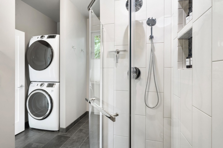 This walk-in shower and laundry area make it easy to clean up and keep moving.