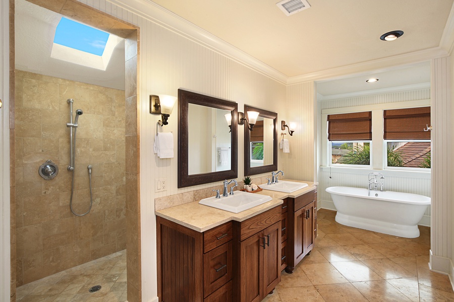 Primary ensuite with dual sinks and a soaking tub.