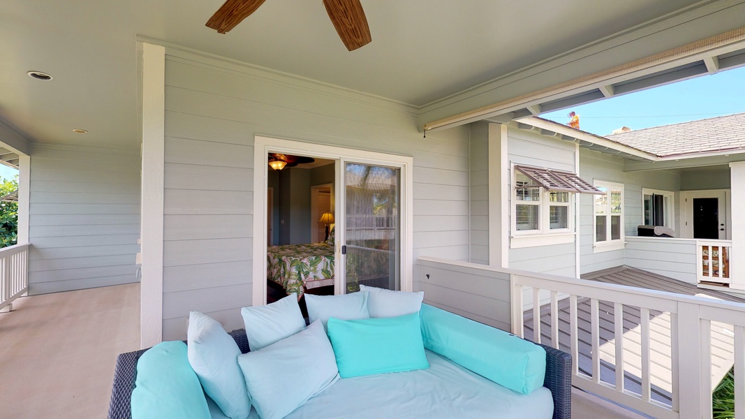The lanai provides comfortable seating and ceiling fan.