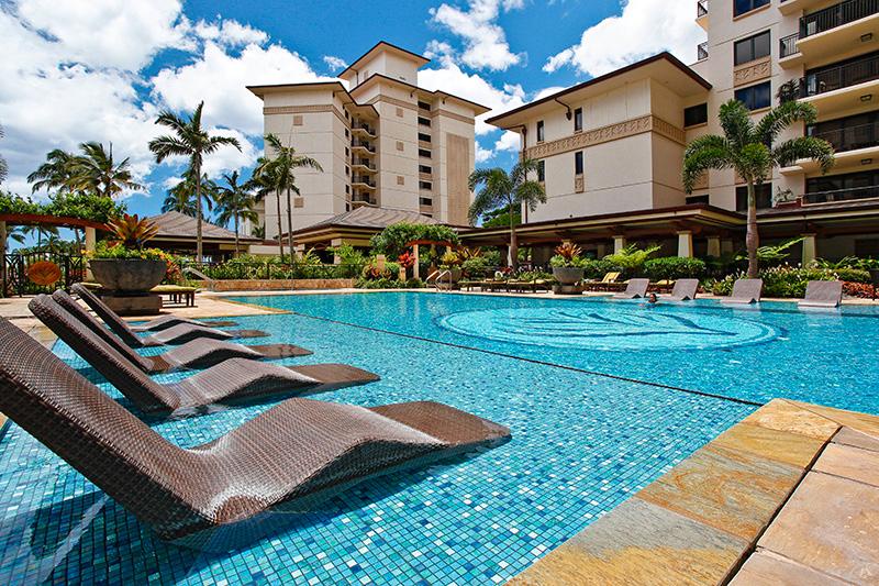 The lap pool in the Beach Tower community, with lounge chairs sitting in the water.