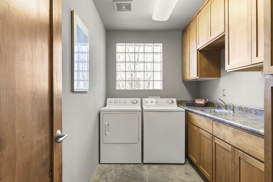 A dedicated laundry room with a washer/dryer