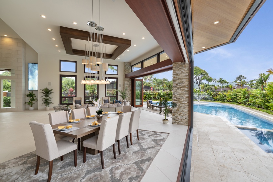 Dine with a view in the elegant dining area with table for eight, just steps away from the pool.