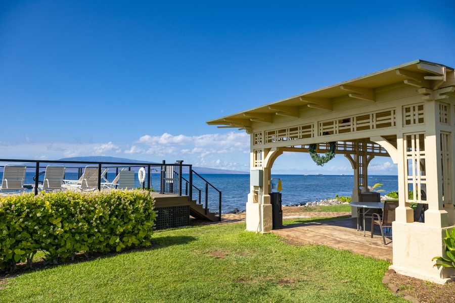 Oceanfront pavilion near the pool—ideal for shaded relaxation and whale watching in season.