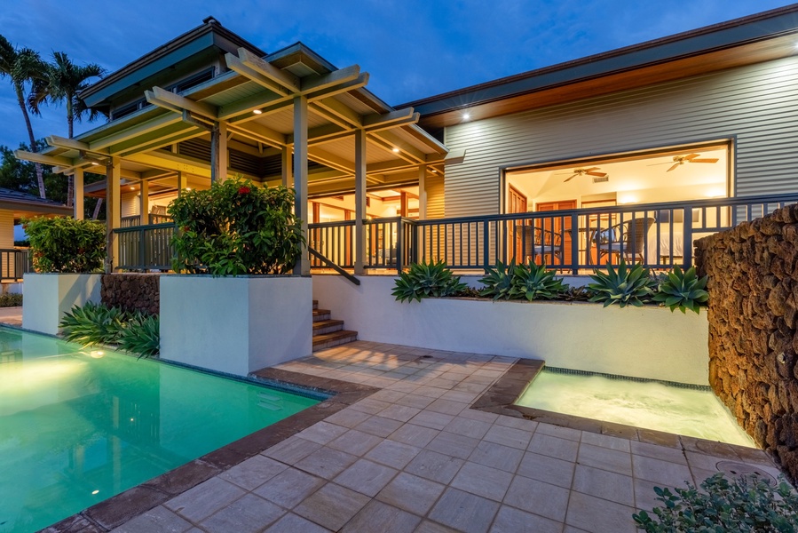 Relax in the glowing spa and pool during twilight