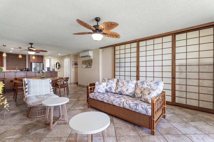 Retreat in the living area with plush couches and occasional seats.