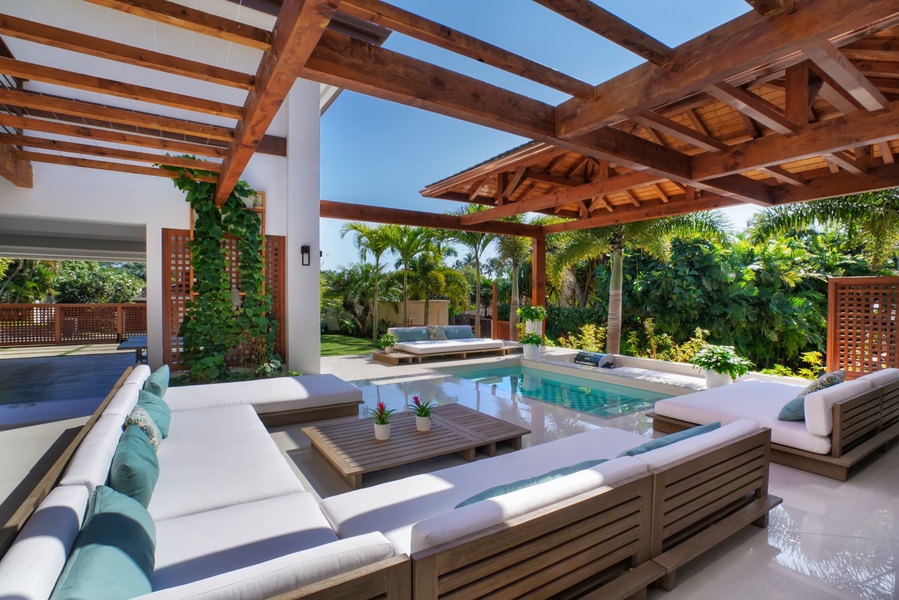 Covered outdoor seating area with ocean breezes—perfect for sunset cocktails or reading in the shade.