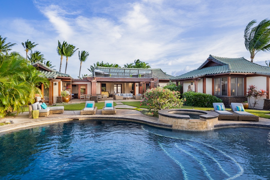Located in the prestigious Champion Ridge community at the Mauna Lani Resort, this sprawling 3,500 square/ft retreat offers four spacious bedrooms and 360-degree panoramic views of the ocean, golf course, volcanic mountains and breath-taking sunrise and su